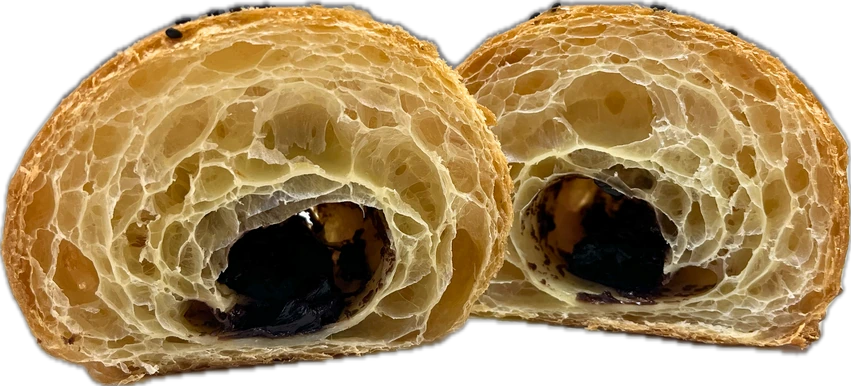 Круасан із шоколадною начинкою після випікання або в розрізі — з фірмового буклету