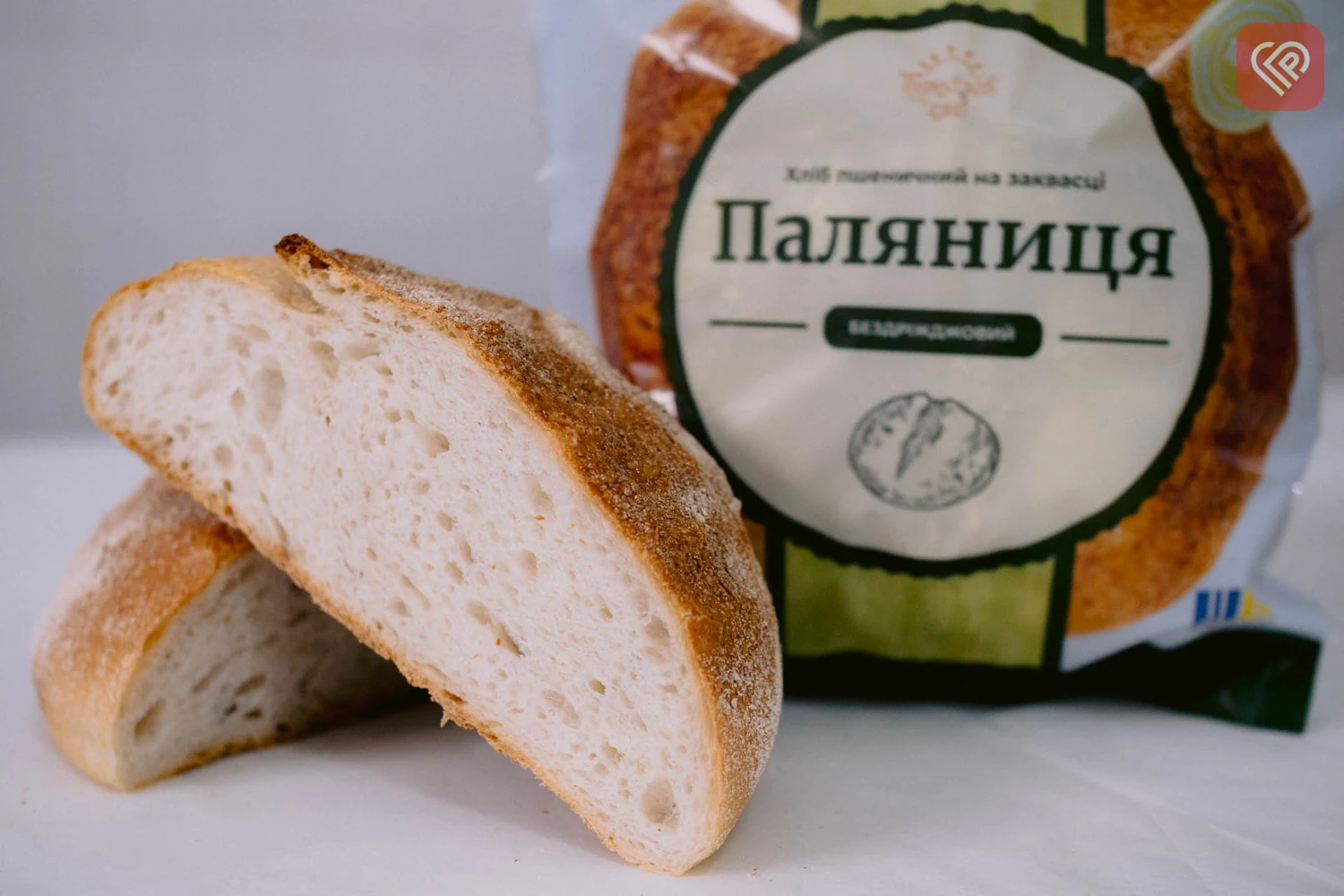 Паляниця на заквасці: цілий хліб, скибки та фірмове пакування Переяслав Хліб